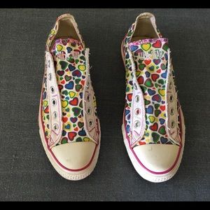 Converse Chuck sneakers, with hearts, gently worn.